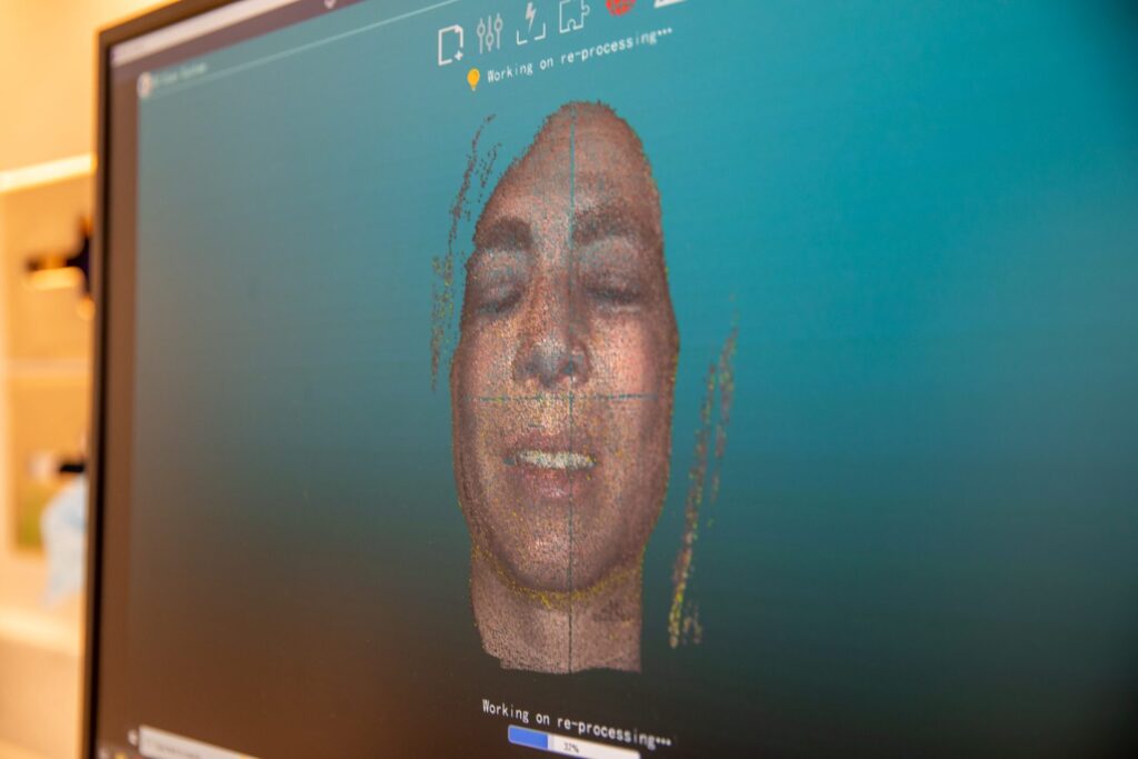 3D facial scan displayed on a monitor for digital treatment planning at Winchester Dental Implant & Sedation Center