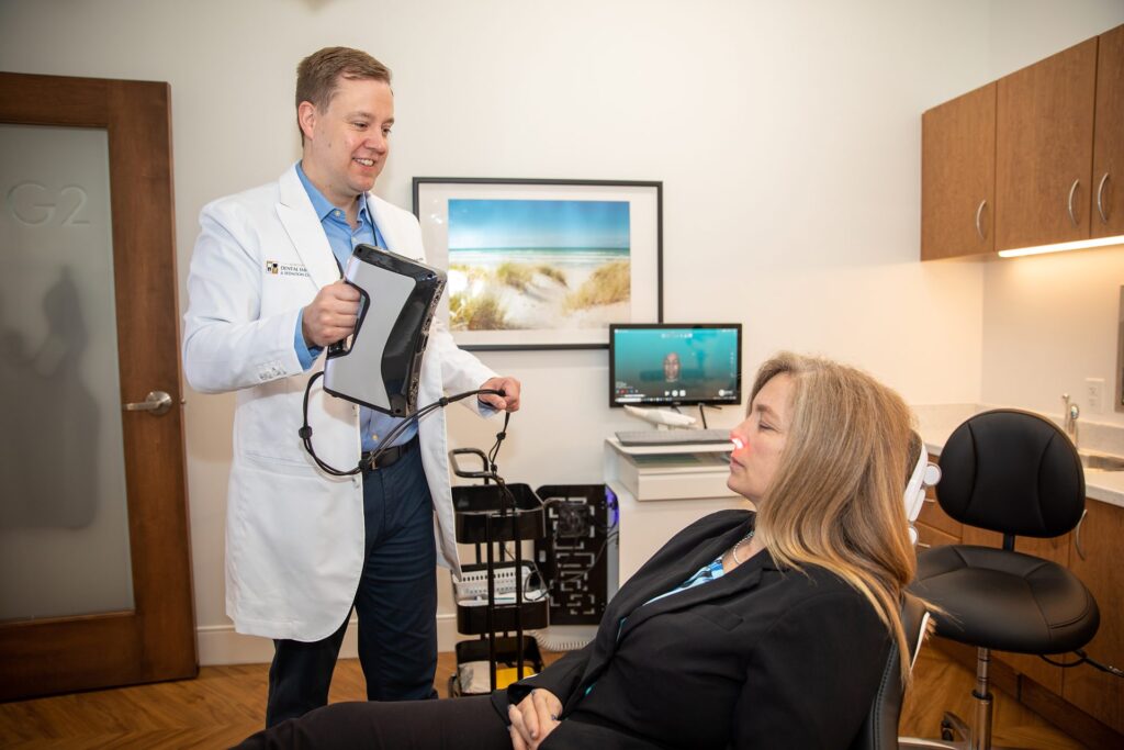 Dr. Niels Oestervemb capturing a 3D face scan of a full-mouth rehabilitation patient
