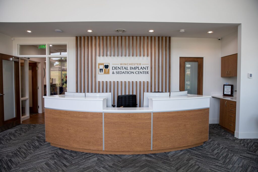 Front desk and reception area of Winchester Dental Implant & Sedation Center