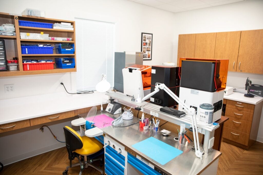 In-house dental laboratory where screw-retained zirconia implant teeth are designed and polished