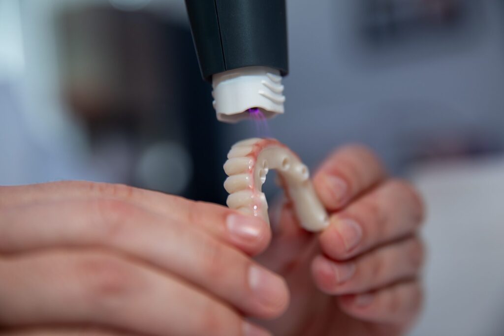 Light-curing a 3D-printed dental prosthesis in the in-house dental lab