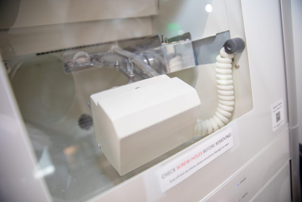 Inside the Roland dental milling machine used for in-house restorations